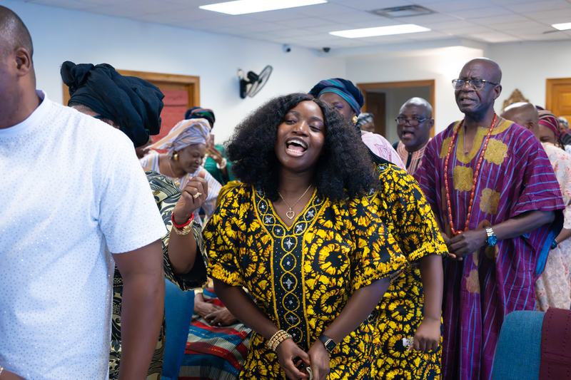 The congregation worshipping during a Sunday service